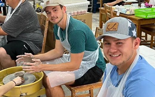 a person holding a bucket of water