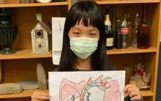 a person holding a sign