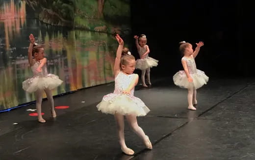 a group of girls dancing