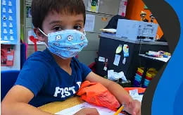 a boy wearing a mask