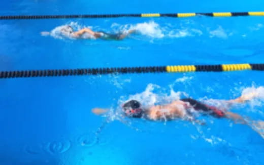 a person swimming in a pool