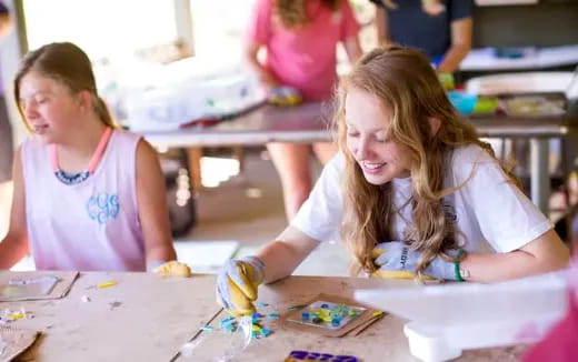 a young girl painting