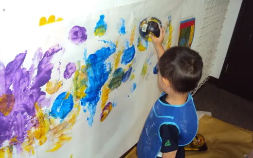 a child painting a picture