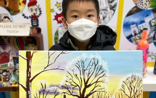 a boy wearing a mask