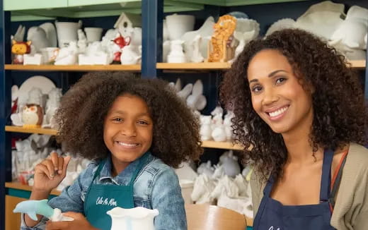 a person and a child smiling