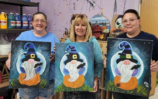 a group of people holding up a blue and yellow sign