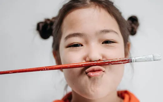 a person with a syringe in the mouth