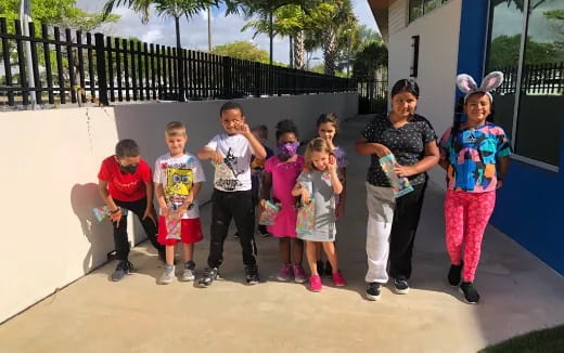 a group of people posing for a photo