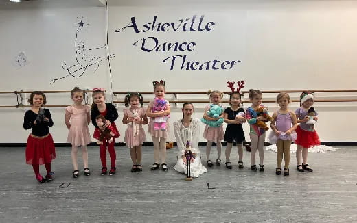 a group of children posing for a photo