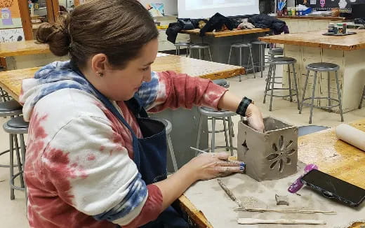 a young girl painting