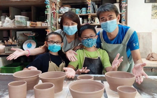 a group of people wearing masks