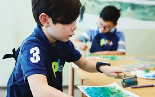 a few young boys playing a game