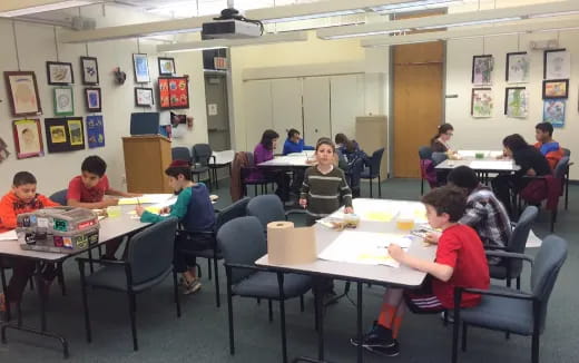 a group of people sitting at tables