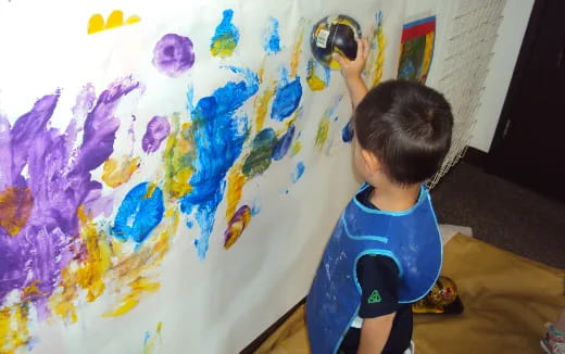 a child painting a picture