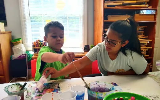 a woman and a child eating