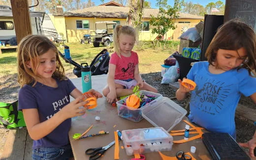 a group of kids painting