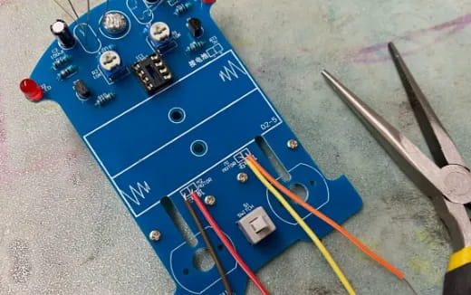 a circuit board with wires