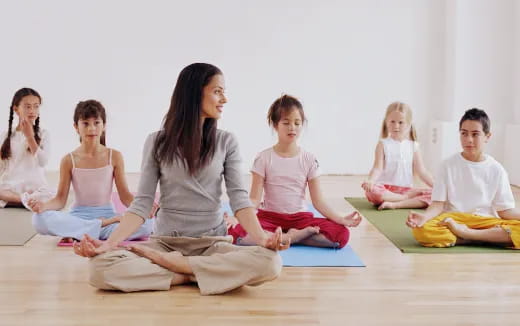 a group of people sitting on the floor