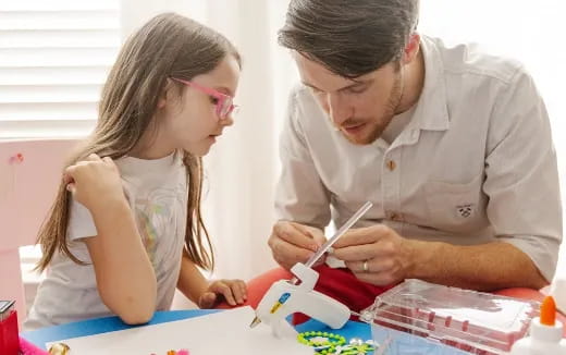 a man and a woman painting