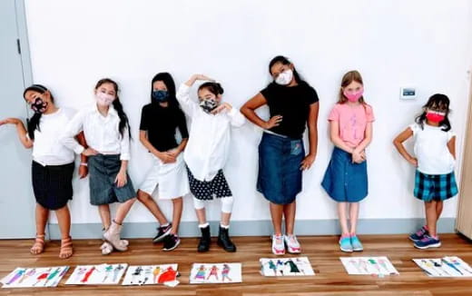 a group of people posing for a photo