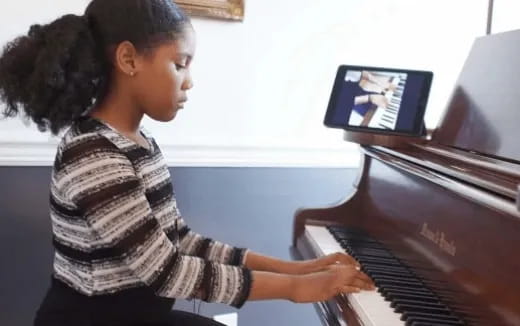 a person playing a piano