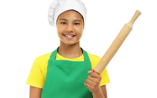 a person holding a wooden stick