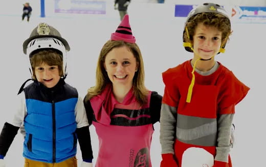 a group of kids wearing clothing