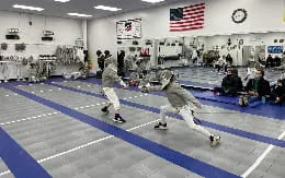 a couple of people in a gym