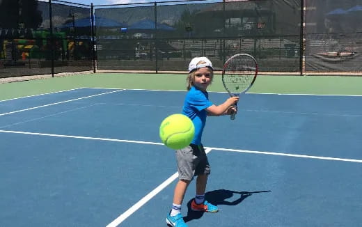 a girl playing tennis