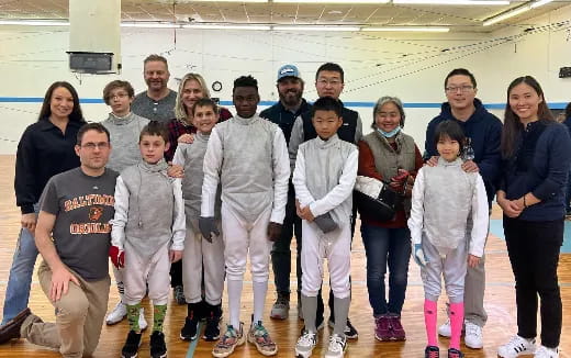 a group of people posing for a photo