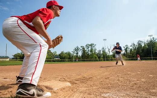 a baseball player prepares to throw a baseball