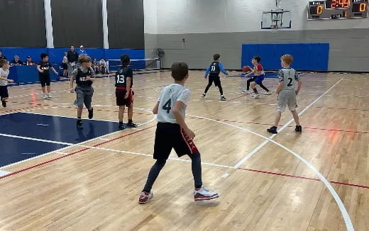 a group of kids playing a sport