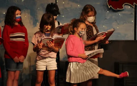 a group of girls in a room