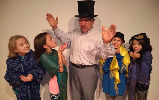 a person in a hat with children