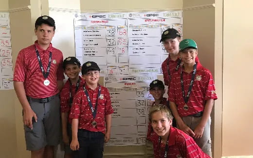 a group of people posing for a photo
