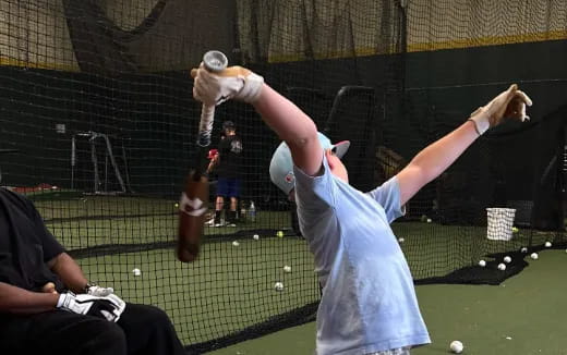 a person holding a ball