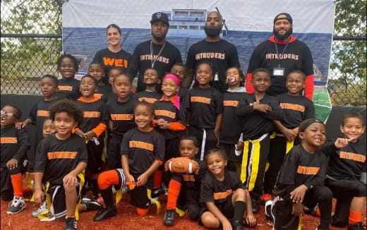 a group of people posing for a photo