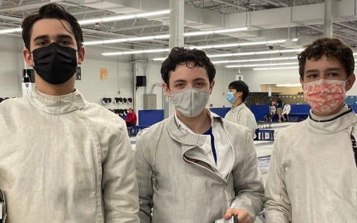 a group of people wearing masks