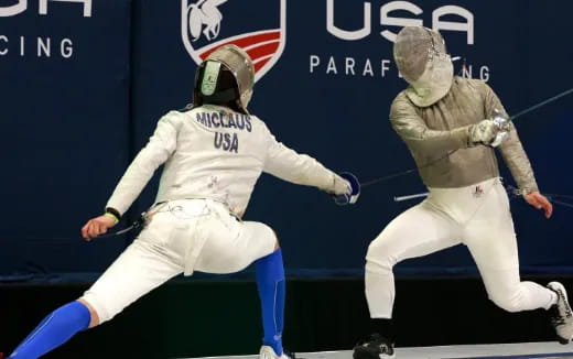 two people in white uniforms