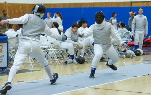 a group of people in white uniforms
