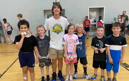 a group of kids posing for a photo