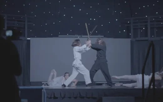 a group of people on a stage