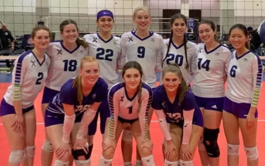 a group of women in athletic uniforms