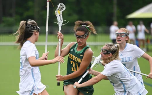 a group of women playing a sport