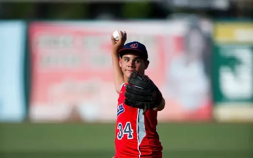 a baseball player throwing a ball