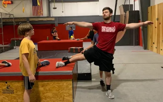 a man lifting a boy up