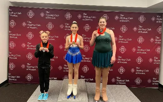 a group of women posing for a photo