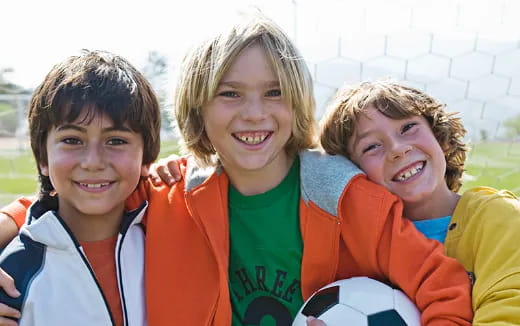 a group of kids smiling