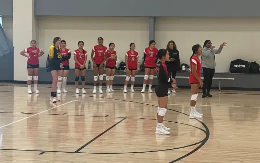 a group of people in a gym