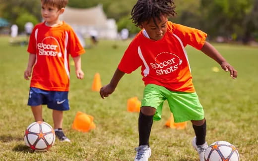 kids playing football on a field